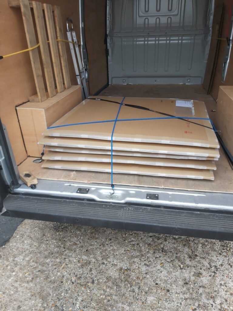 Flat-pack goods tightly packed for direct van delivery