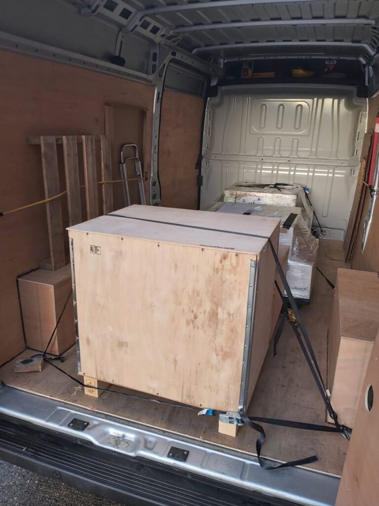 Cargo in transit, tightly strapped for nationwide B2B courier service