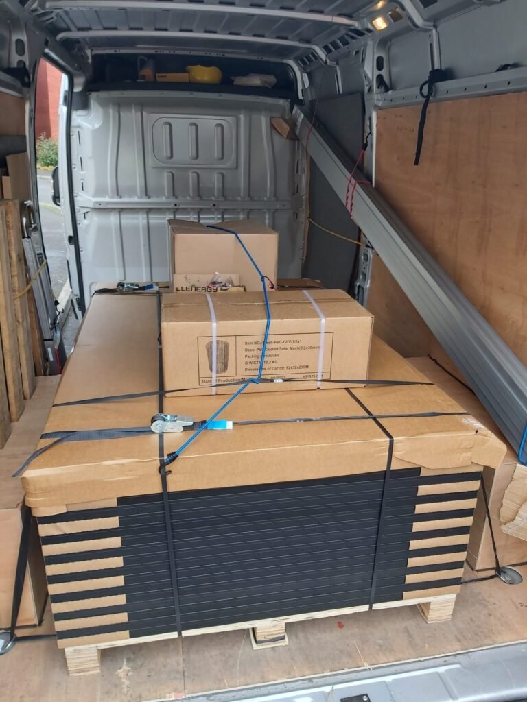 Large panel units secured inside courier van