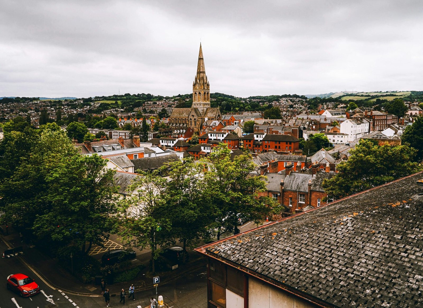Aerial view of Exeter, England showcasing historic architecture and scenic urban landscape.
