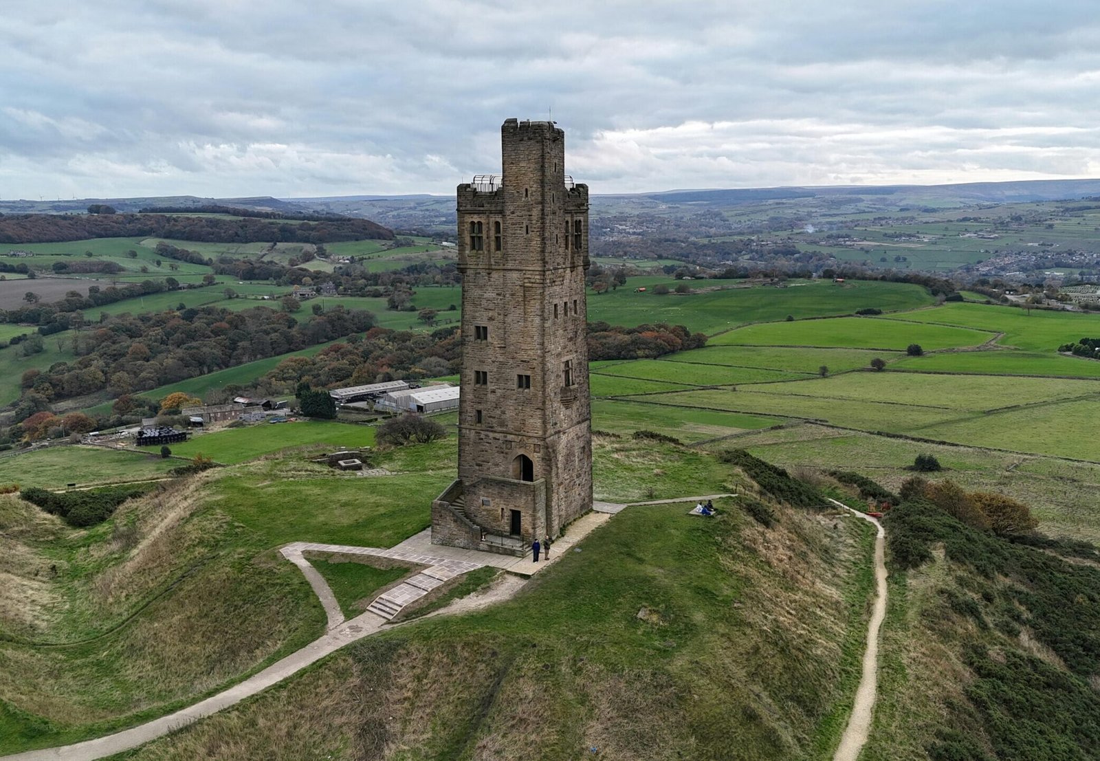 Aerial shot of the Victoria Tower amidst the rolling green hills of Yorkshire.