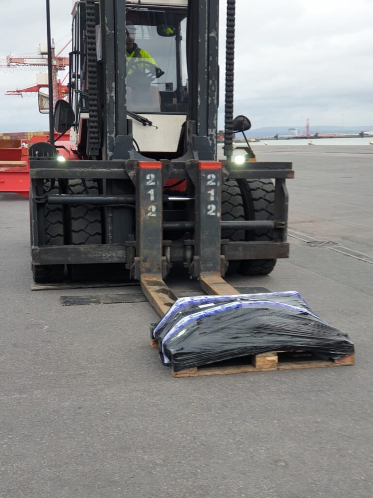 Pallets dropped by forklift for large-scale delivery jobs